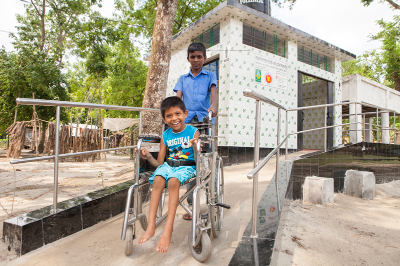 A school latrine constructed under a HYSAWA project with ramp access, making it more accessible for students with disabilities