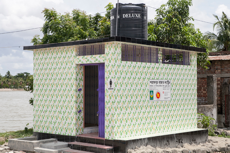 Front view of a bazaar latrine built with HYSAWA’s financial and technical support