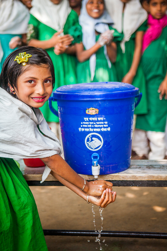 Community Organizers of HYSAWA projects orient school children about the importance of hand-hygiene in the prevention of disease and teach them the proper way of washing hands